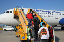 Cách làm thủ tục, hướng dẫn các bước đi máy bay Vietravel Airlines