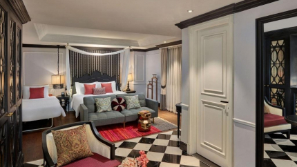 Phòng Family Triple Suite Balcony tại AIRA Boutique Hanoi Hotel