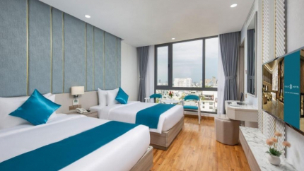Phòng Deluxe Triple tại Calix Đà Nẵng Hotel