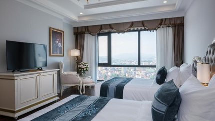 2 giường đôi tại phòng Deluxe