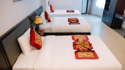 Phòng Deluxe Triple của khách sạn 3* Grand Flamant thị trấn Sapa