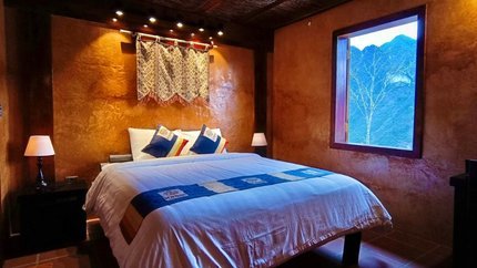 Giường ngủ tại Bungalow Gia Đình
