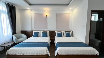 Phòng Grand Deluxe Family City View with Balcony Khách sạn Hodota The Blessed Virgin