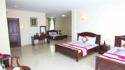 Phòng 2 giường đôi và 1 giường đơn tại Minh Đạm Vũng Tàu