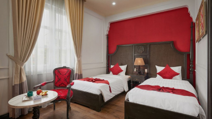 Phòng Deluxe tại Manoir Des Arts Hotel 4*