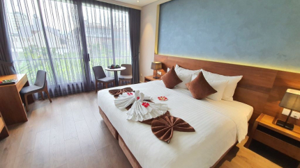 Phòng Deluxe Double/Twin with Balcony Orchid Hotel 3*