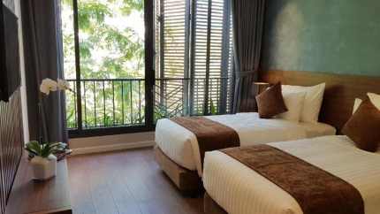 Phòng Deluxe Double/Twin with Window Orchid Boutique 3*