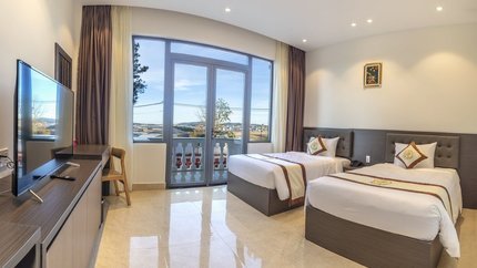 Phòng Deluxe tại Rừng Lá Kim Resort