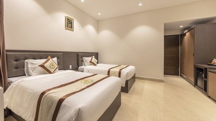 Phòng Deluxe với gam màu nâu gỗ trầm ấm