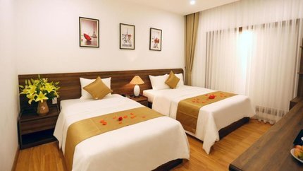 Phòng Superior Family với 1 giường đôi và 1 giường đơn