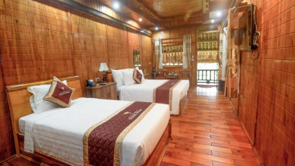 Deluxe Triple Room Tại Khu nghỉ dưỡng Thung Nham 4*