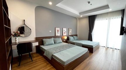 Phòng ngủ mang tông màu trầm ấm cúng