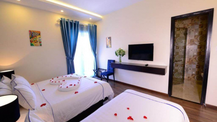 DELUXE TRIPLE ROOM WITH BALCONY