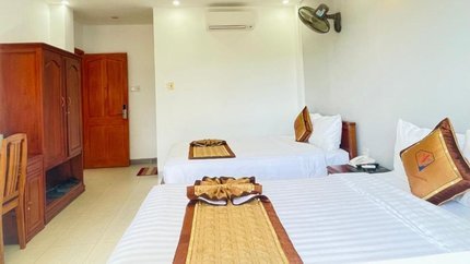 Giường ngủ rộng rãi, tiện nghi đầy đủ