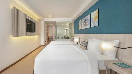 Deluxe Triple City view with balcony