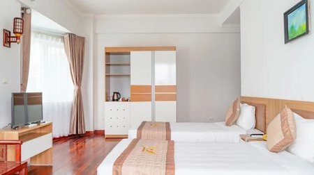 Phòng Standard Twin (1 giường đôi + 1 giường đơn)