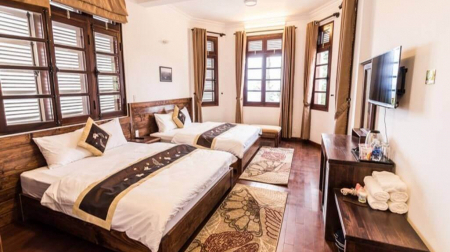 Phòng Deluxe Family - Ban Công Hướng Vườn