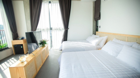 Deluxe Triple Bed with Balcony