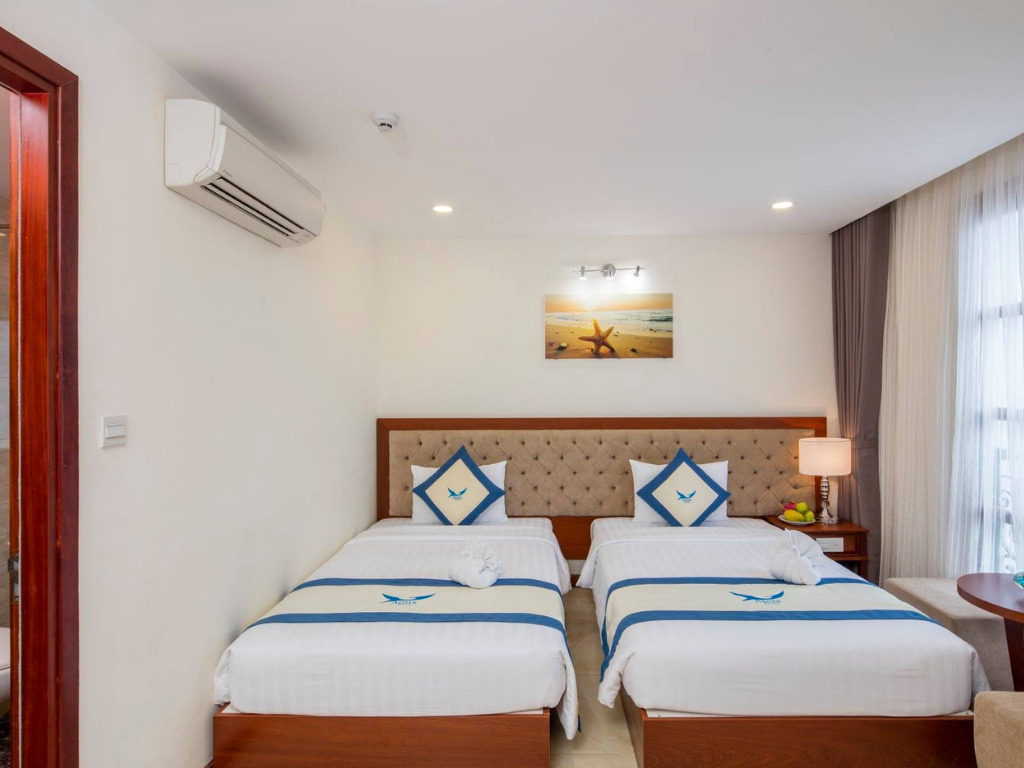 Phòng Deluxe Hướng Thành Phố Tại Apus Nha Trang