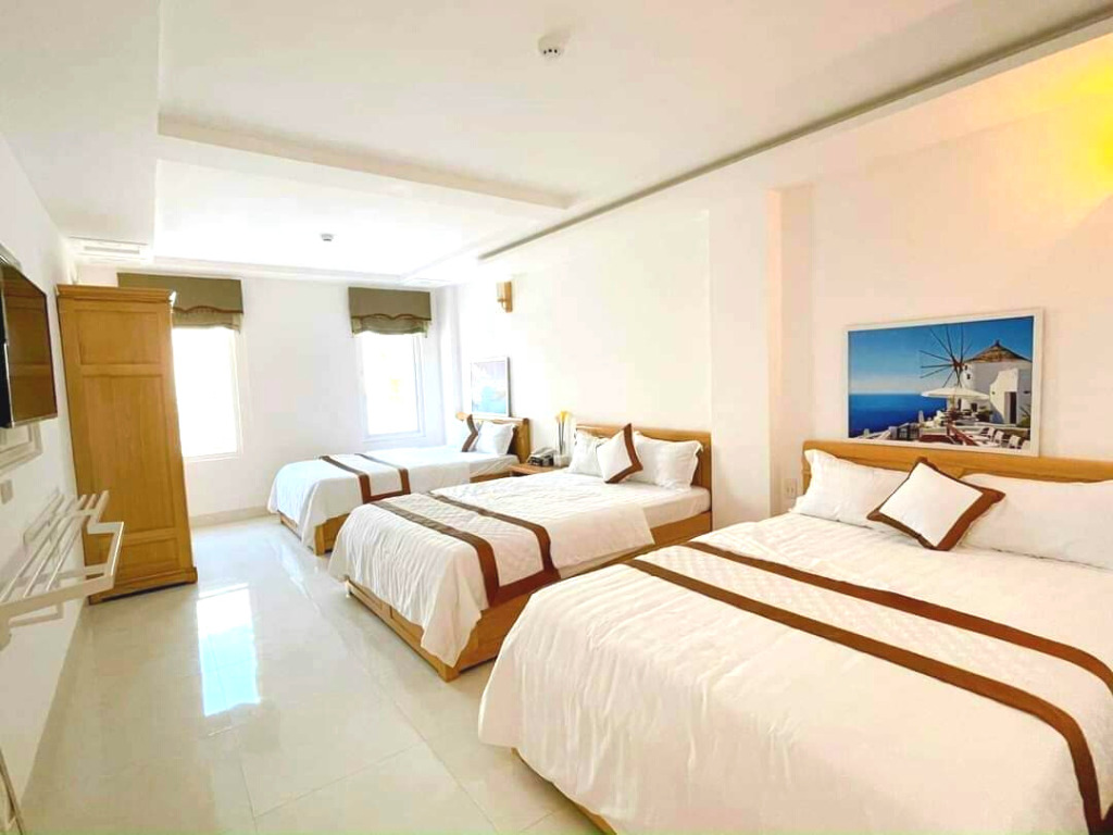 Phòng Deluxe Triple tại Caroline Beach Hotel