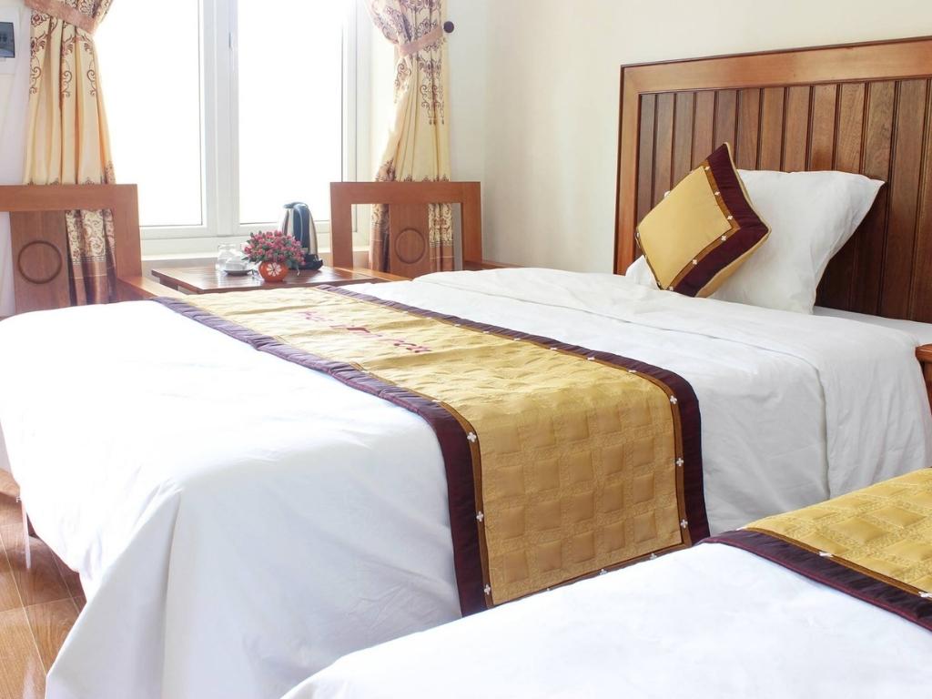 Phòng Deluxe Triple tại khách sạn Hòa Bình Đồng Hới