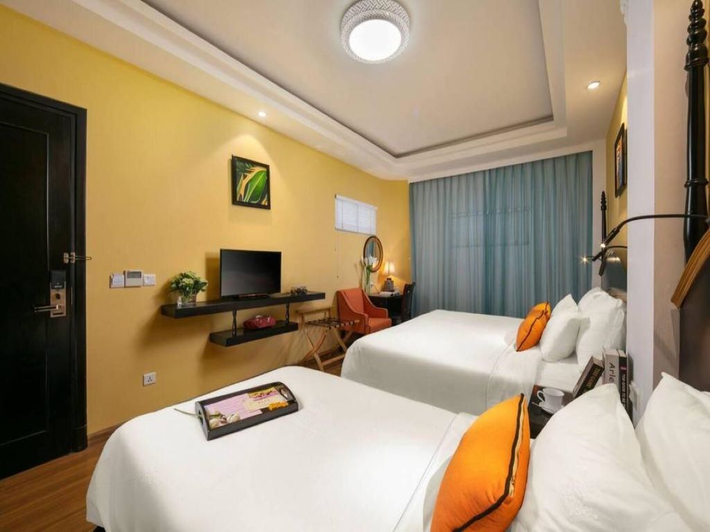 Phòng Deluxe Family Kén Hotel By Connek 3*