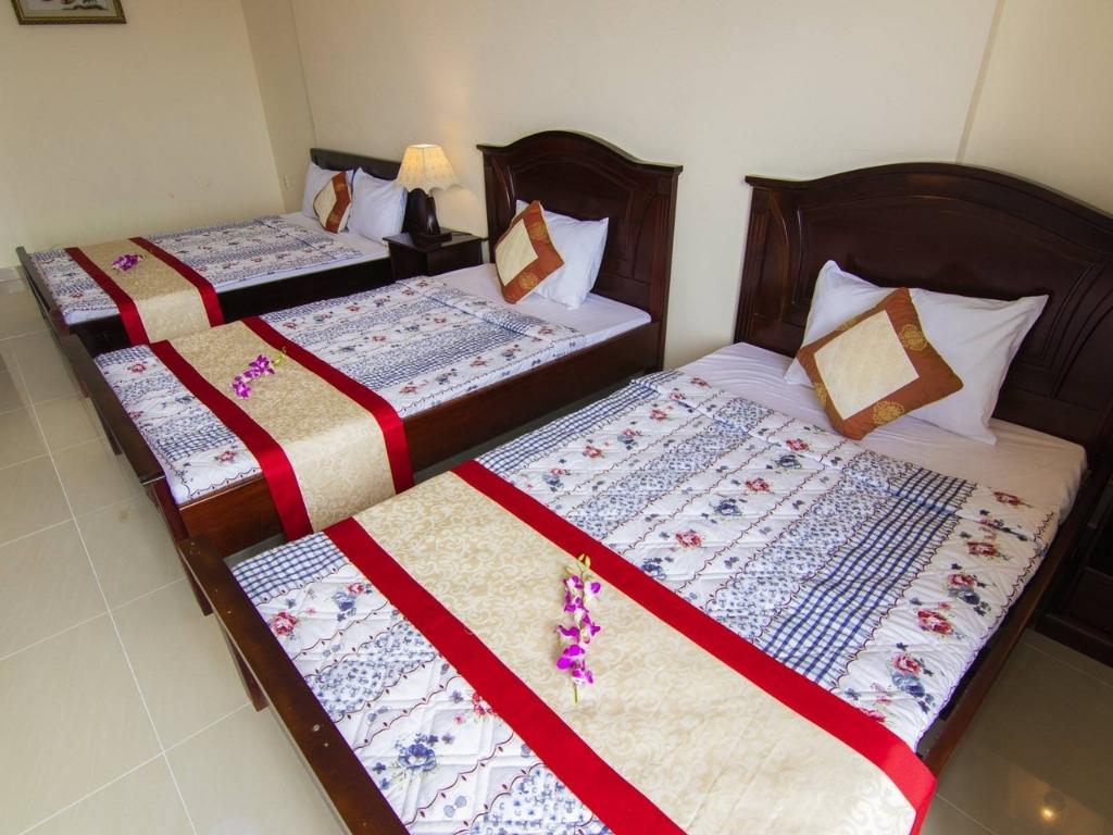 Phòng 2 giường đơn và 1 giường đôi tại khách sạn Minh Đạm Vũng Tàu 3 sao