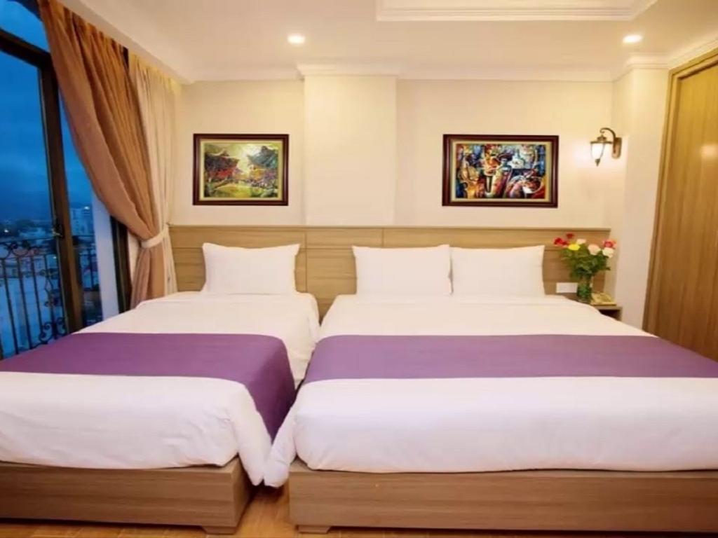 Phòng Deluxe Quad tại khách sạn Thái Bình Dương