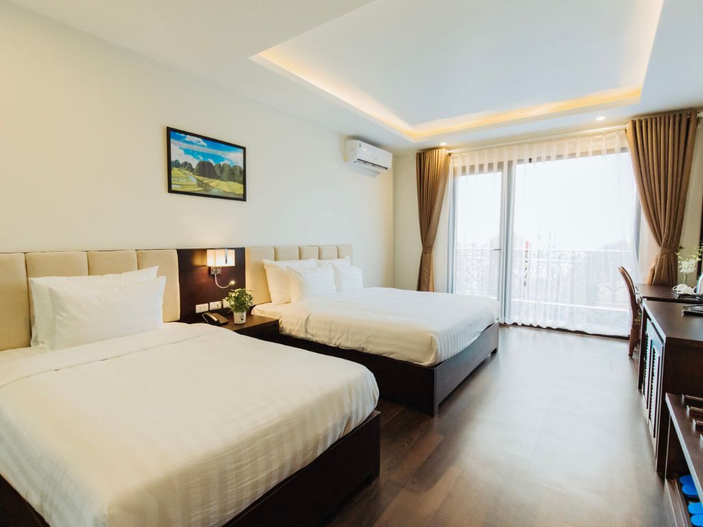 Phòng Suites Family with Balcony tại Hotel Nội Bài Paragon