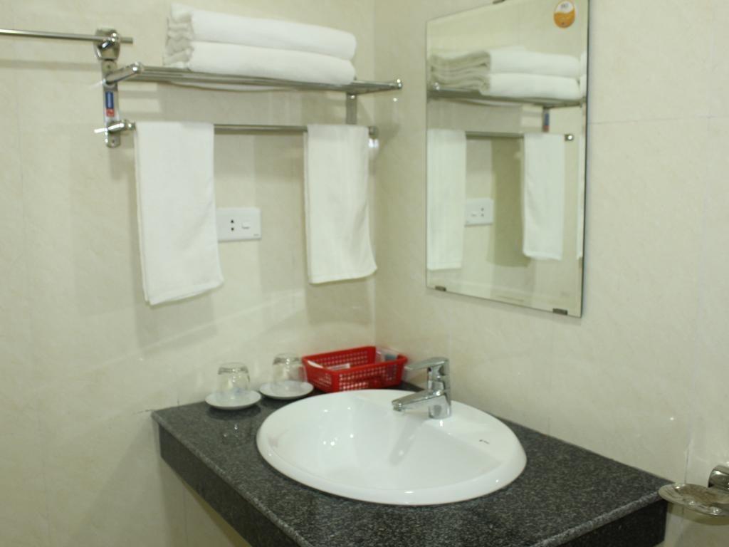 Phòng tắm tại Phadin Hotel