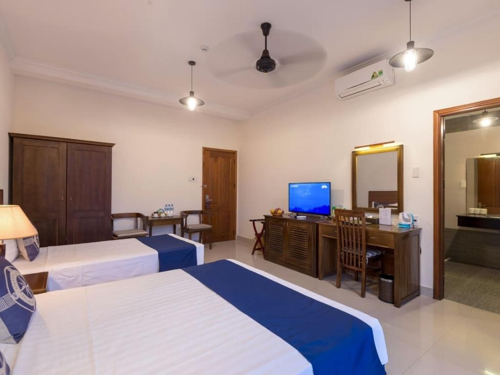 Phòng Commodore Family tại Santa Sea Hoian Villa 3 sao