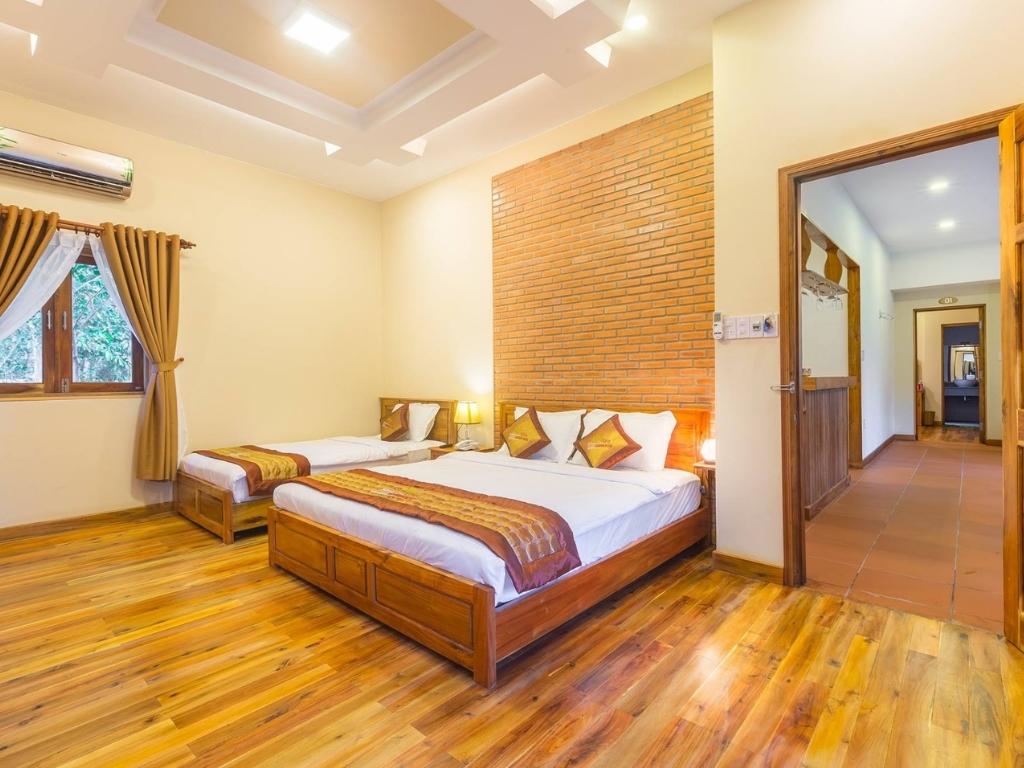 Phòng Twin Garden View tại The Garden House Resort