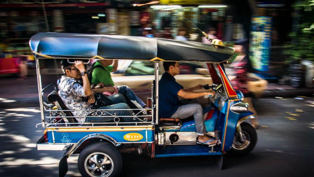 Tourists experience tuktuk in Siem Reap